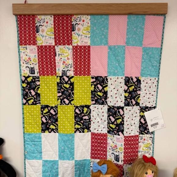 Hand Quilted Quilt 35” x 45”.